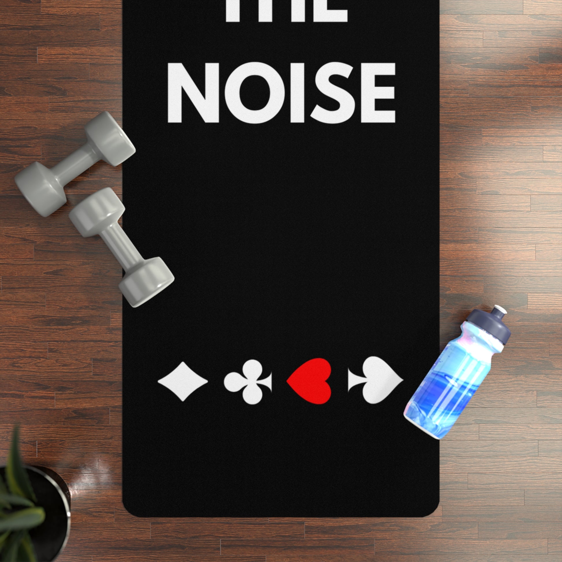 Fold The Noise. Black Yoga Mat With Card Suits In Session